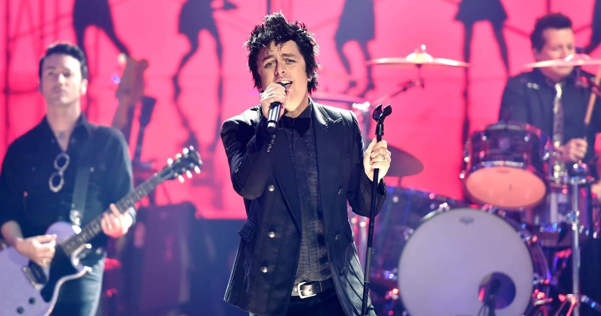 'Green Day's' pre‑game performance continued their tradition of weaving sharp political commentary into live shows (Getty Images) 