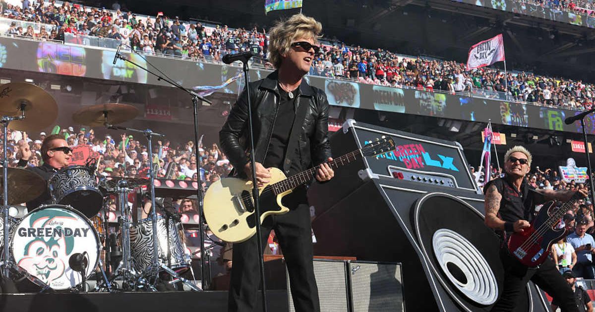 Green Day honored Super Bowl MVPs at Super Bowl LX, performing hits without political messages while celebrating NFL legends (Kevin Mazur/Getty Images for Roc Nation)