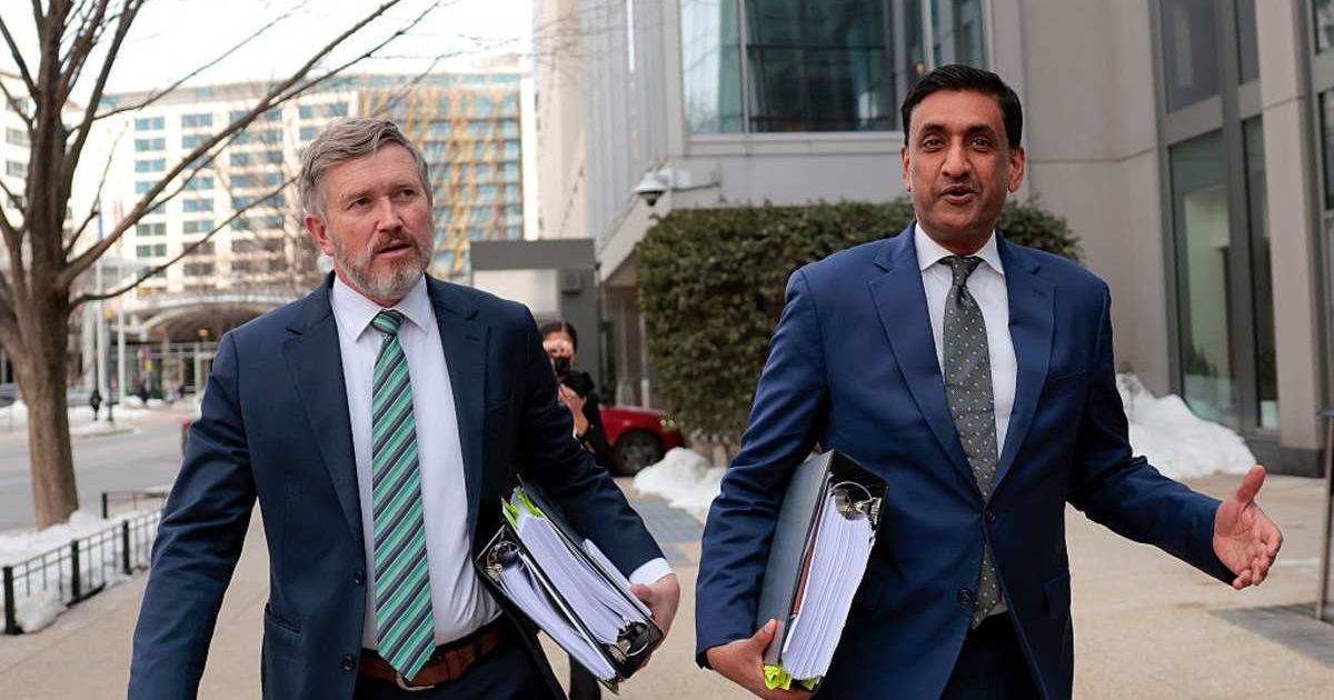 US Rep Thomas Massie (R-KY) (L) and Rep Ro Khanna (D-CA) arrive at the Department of Justice office on February 9, 2026, in Washington, DC (Getty Images)