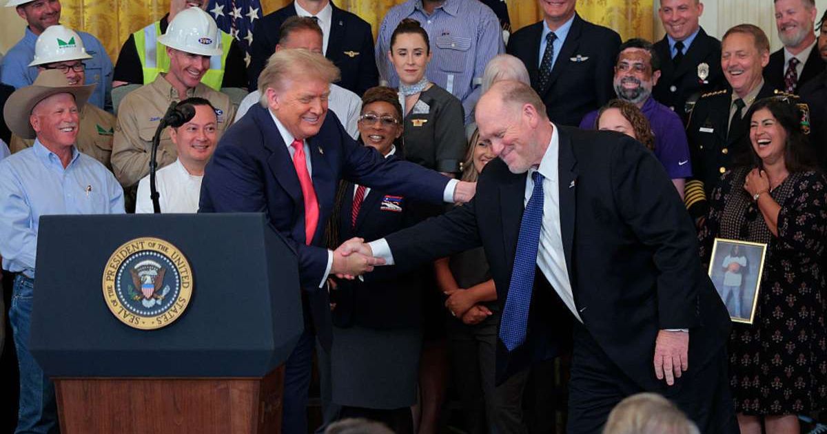 President Donald Trump shook hands with Border Czar Tom Homan during an event at the White House in Washington, DC (Chip Somodevilla/Getty Images)