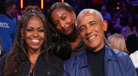 Barack and Michelle Obama courtside with daughter Sasha at NBA All-Star Game