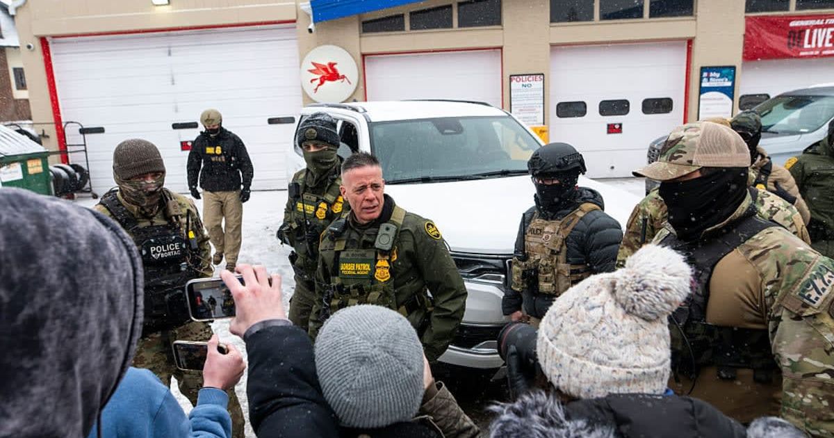 Border Patrol Commander Gregory Bovino looked on as he was confronted by community members on January 21, 2026, in Minneapolis, Minnesota (Stephen Maturen/Getty Images)