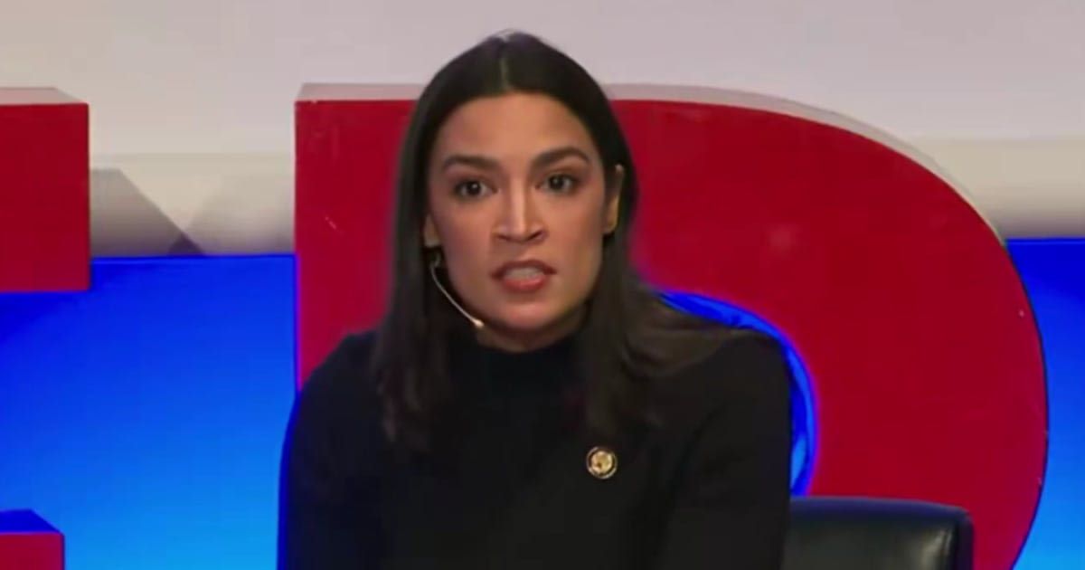 Alexandria Ocasio-Cortez was seen speaking during a panel at the Munich Security Conference in Germany (Screengrab/@RedWave_Press/X)