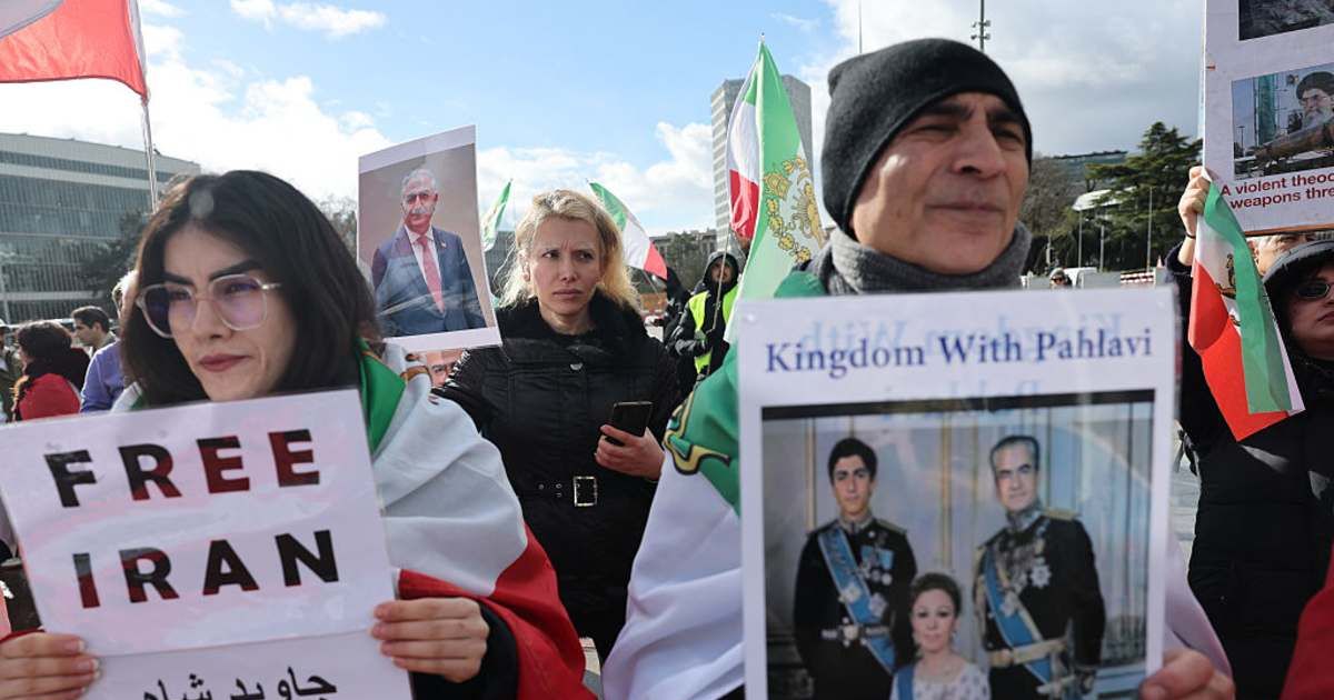 Supporters of Reza Pahlavi gather with Iranian flags outside the UN as US-Iran nuclear talks take place, February 17, 2026 (Sedat Suna/Getty Images)
