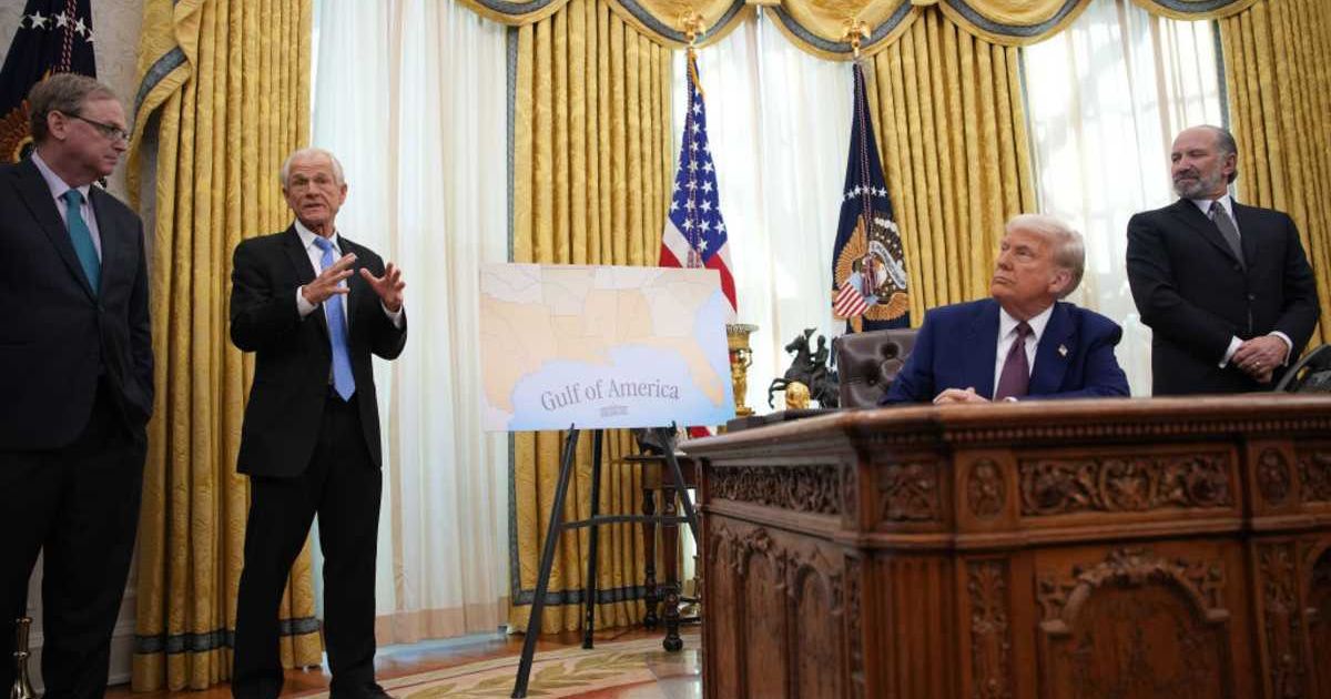 Peter Navarro, Kevin Hassett, and Howard Lutnick speak after Donald Trump signed an executive order on reciprocal tariffs at the White House on February 13, 2025 (Getty Images)