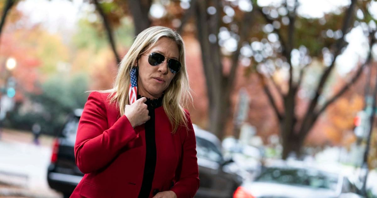 Marjorie Taylor Greene alleged that the Trump administration employs 'Q nods' to influence and 'brainwash' the MAGA movement (Getty Images)