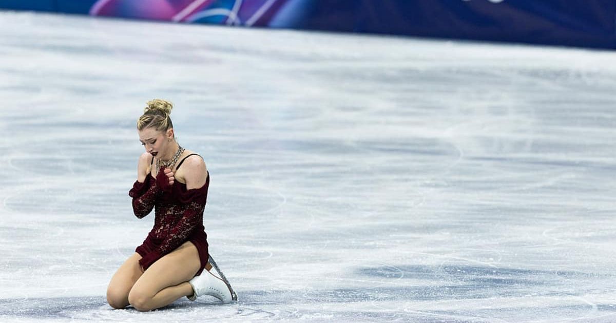 Amber Glenn of the United States reacted emotionally after competing in the Women’s Short Program at the 2026 Winter Olympics (Steve Christo - Corbis/Corbis via Getty Images)