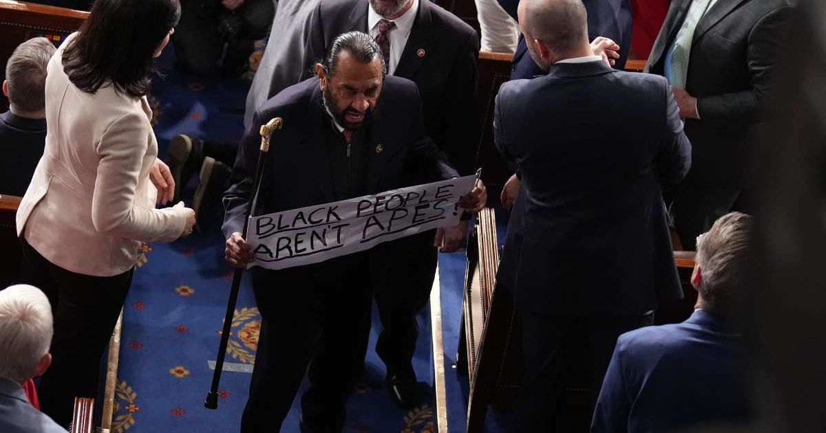 Al Green (D-TX) holds a sign as he is ejected from the chamber as Trump delivers his State of the Union address during a Joint Session of Congress at the Capitol on February 24, 2026, in Washington, DC (Andrew Harnik/Getty Images)
