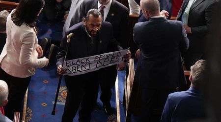 Al Green escorted out after displaying 'Black people aren't apes' sign during Trump's SOTU address