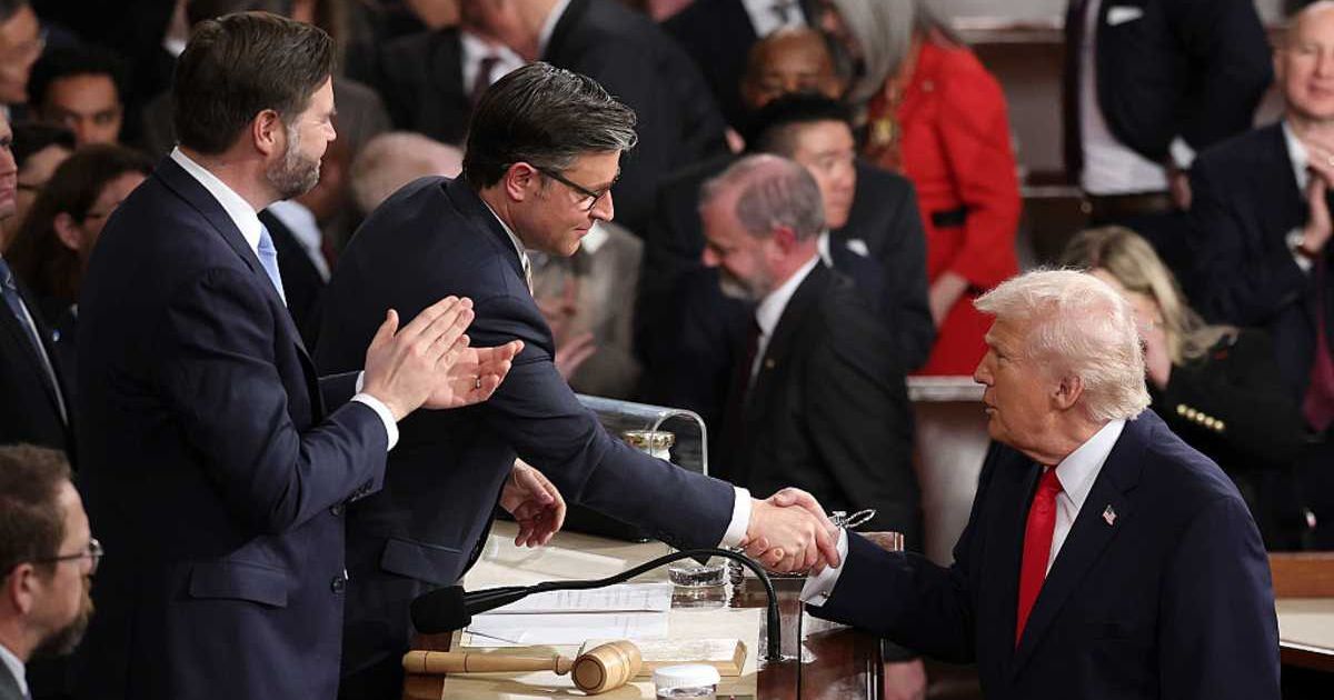 President Donald Trump shakes hands with Speaker of the House Mike Johnson after his State of the Union address during a Joint Session of Congress at the US Capitol on February 24, 2026, in Washington, DC (Getty Images)