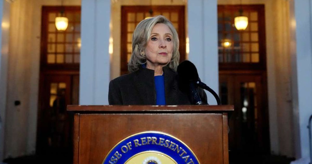 Former US Secretary of State Hillary Clinton speaks to the press after testifying in a closed-door deposition with the House Oversight Committee in Chappaqua, New York.  (Getty Images) 