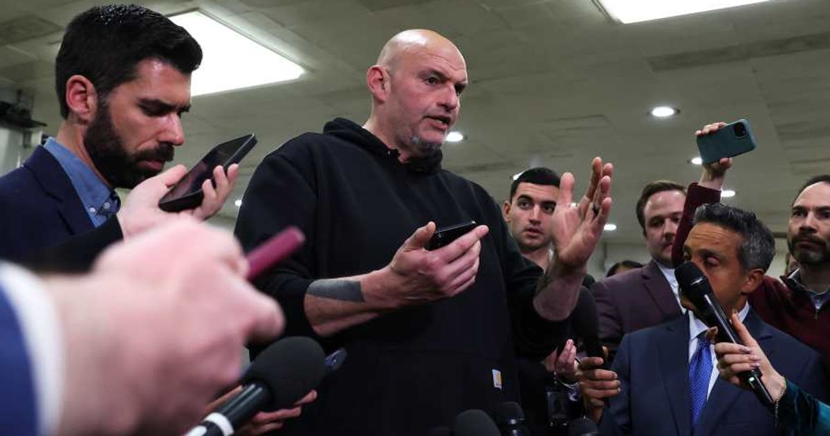 Speaking at the Capitol, John Fetterman asks why leaders cannot admit the world is safer now. He rejects party lines, choosing to support the president's move to erase a major nuclear threat (Anna Moneymaker/Getty Images)