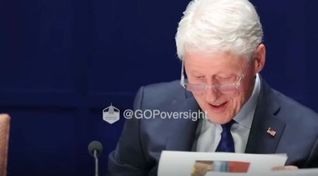 Bill Clinton grins, chuckles while reviewing old Epstein file photo during deposition