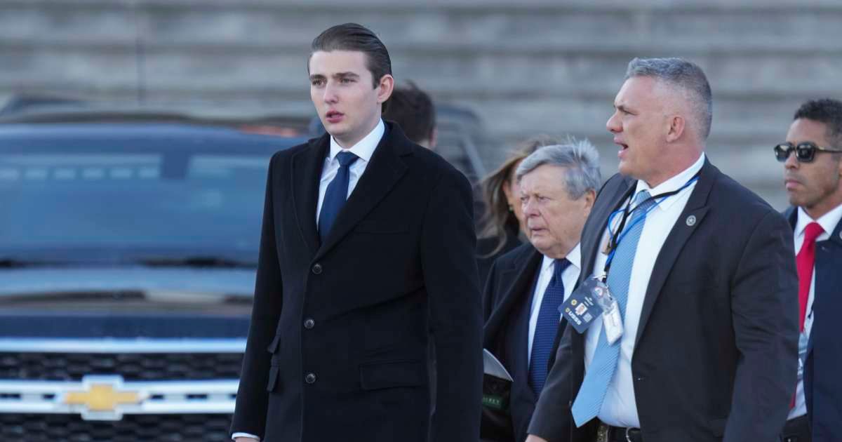 An online post claimed that the White House said President Donald Trump's youngest son, Barron Trump, was unable to serve in the military due to his height (Getty Images)