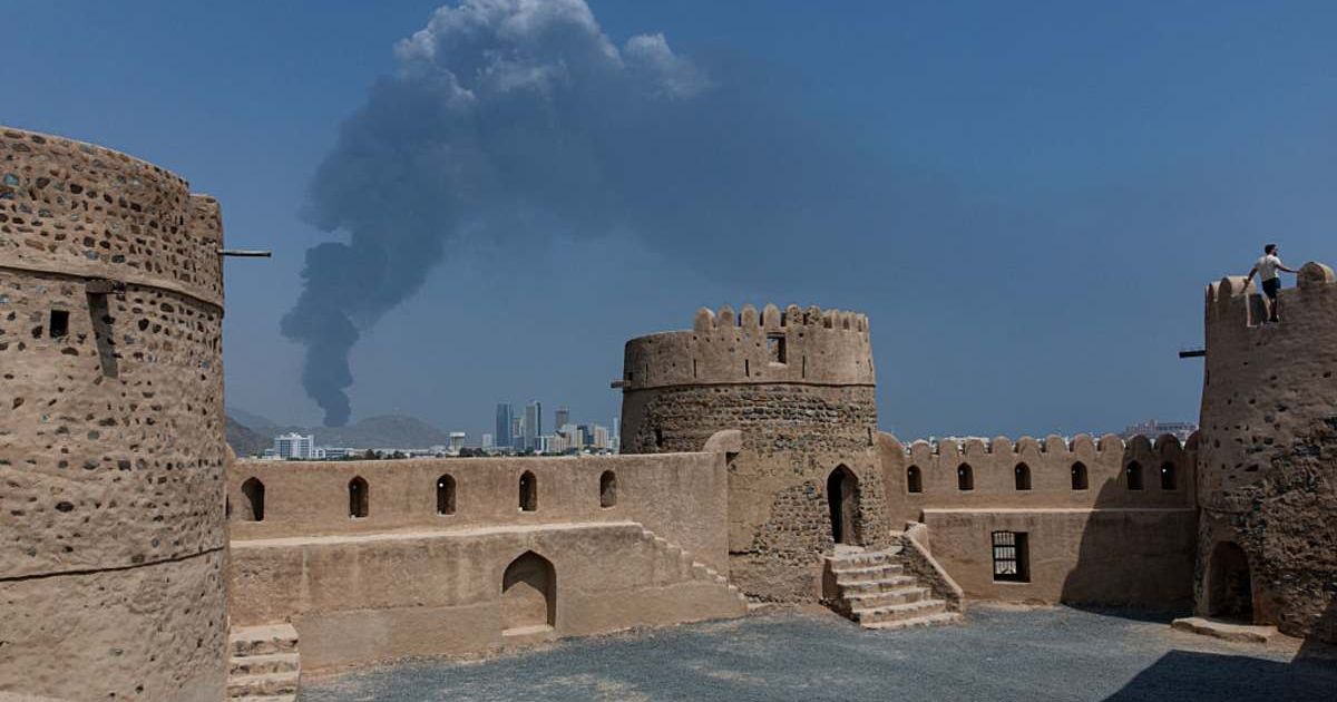 Smoke rises after an explosion in the industrial zone, caused by debris after interception of a drone by air defense, according to the Fujairah media office on March 05, 2026, in Fujairah, United Arab Emirates (Christopher Pike/Getty Images)