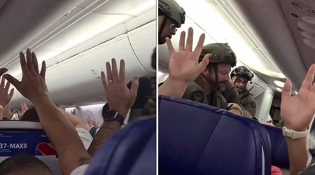 Video shows Southwest passenger dragged off plane after security scare forces Atlanta landing