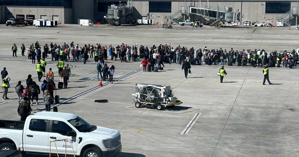 Authorities ordered a full ground stop and terminal sweep as K9 units and law enforcement responded to a credible security incident (Screengrab/KCTV5/X)