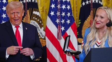 Bobsledder Kaillie Humphries presents Trump with her Olympic Order of Ikkos medal