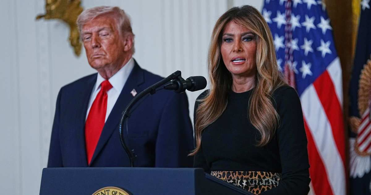 First Lady Melania Trump delivered remarks urging women to use their influence to strengthen the nation as President Donald Trump looked on at the White House (AP Photo/Allison Robbert)