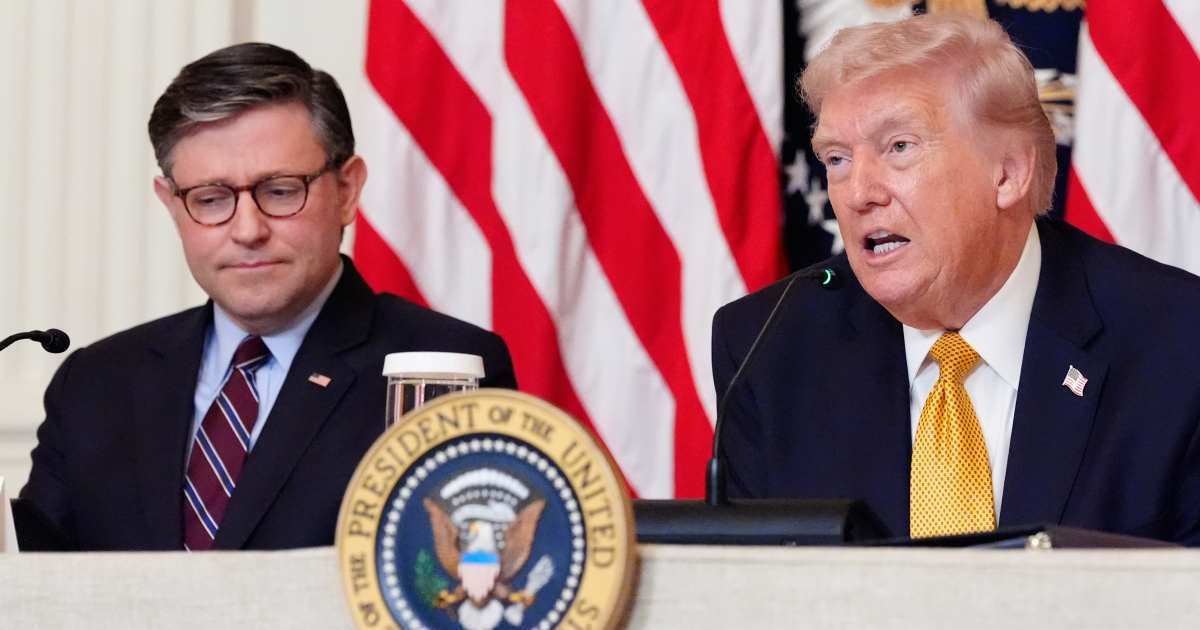 Donald Trump speaks during a board meeting of the John F Kennedy Center for the Performing Arts in the East Room of the White House on March 16, 2026, as House Speaker Mike Johnson looks on (AP Photo/Alex Brandon)
