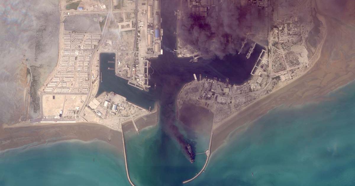 Bandar Abbas port showed burning ships after strikes, as US Central Command said it has 'sank or damaged more than 100 Iranian vessels so far' (Planet Labs PBC via AP)