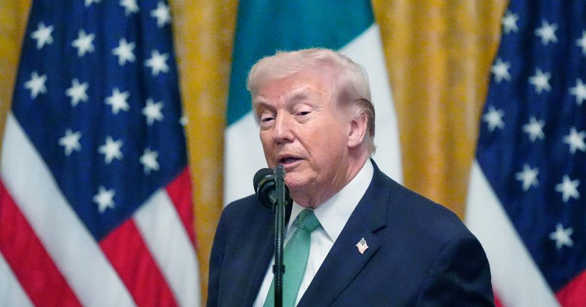 President Donald Trump speaks during a St Patrick’s Day shamrock presentation with Irish Prime Minister Micheál Martin in the East Room of the White House on March 17, 2026, in Washington (AP Photo/Alex Brandon)