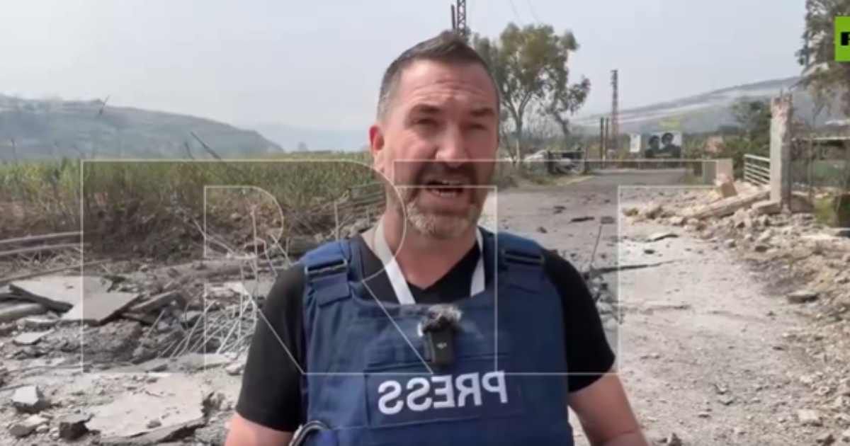 RT journalist and cameraman were injured after an alleged Israeli strike landed meters away during live report (RT/ X)