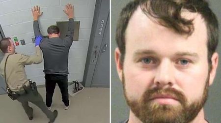 Booking video shows Joseph Duggar being patted down and searched against wall after arrest