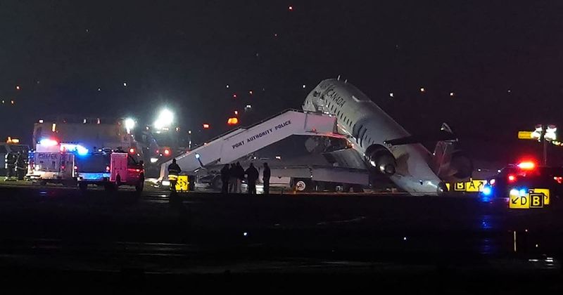 Air Canada Express plane crashes into fire truck at New York’s LaGuardia Airport leaving 2 dead
