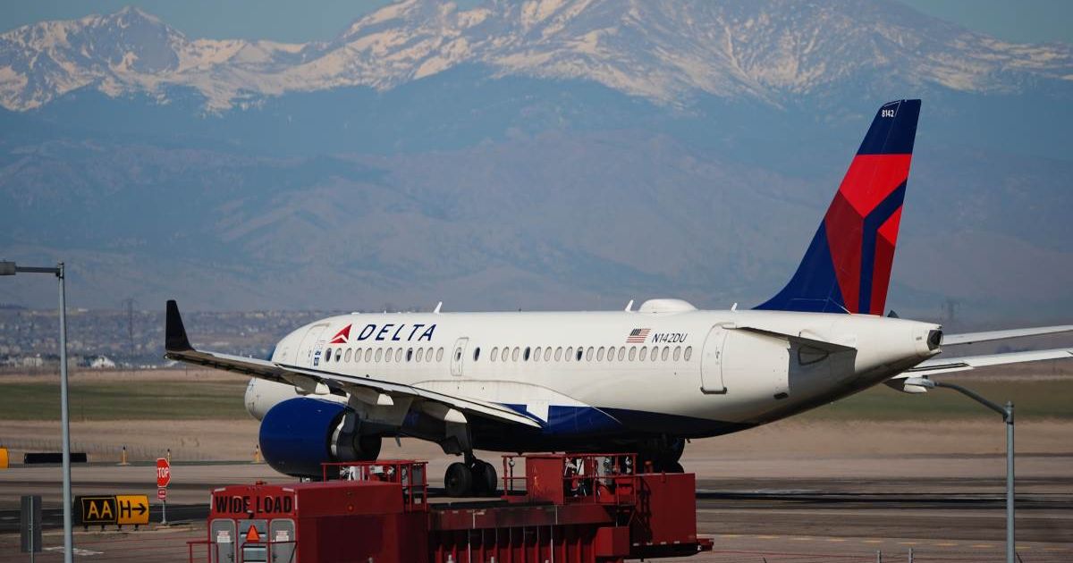 A Delta Airlines jetliner taxis to a runway for take off from Denver International Airport Friday, March 20, 2026, in Denver (AP Photo/David Zalubowski)
