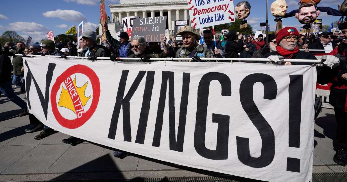 Demonstrators rally in front of the Lincoln Memorial during the 'No Kings' protest in Washington, Saturday, March 28, 2026 (AP Photo/Jose Luis Magana)