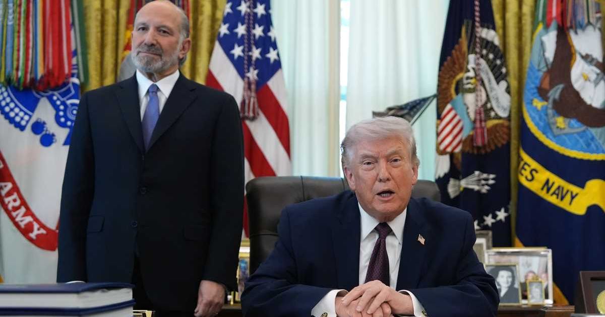 Donald Trump pressed reporters to clarify an alleged Iran threat to US companies, but they failed to explain it clearly (AP Photo/Alex Brandon)