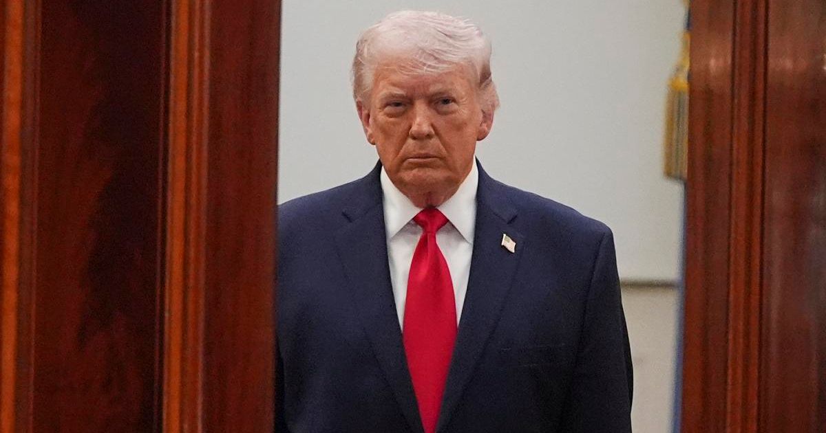 Donald Trump walked from the Blue Room to deliver an address on the Iran war from the Cross Hall of the White House on April 1, 2026, in Washington (AP Photo/Alex Brandon, Pool)