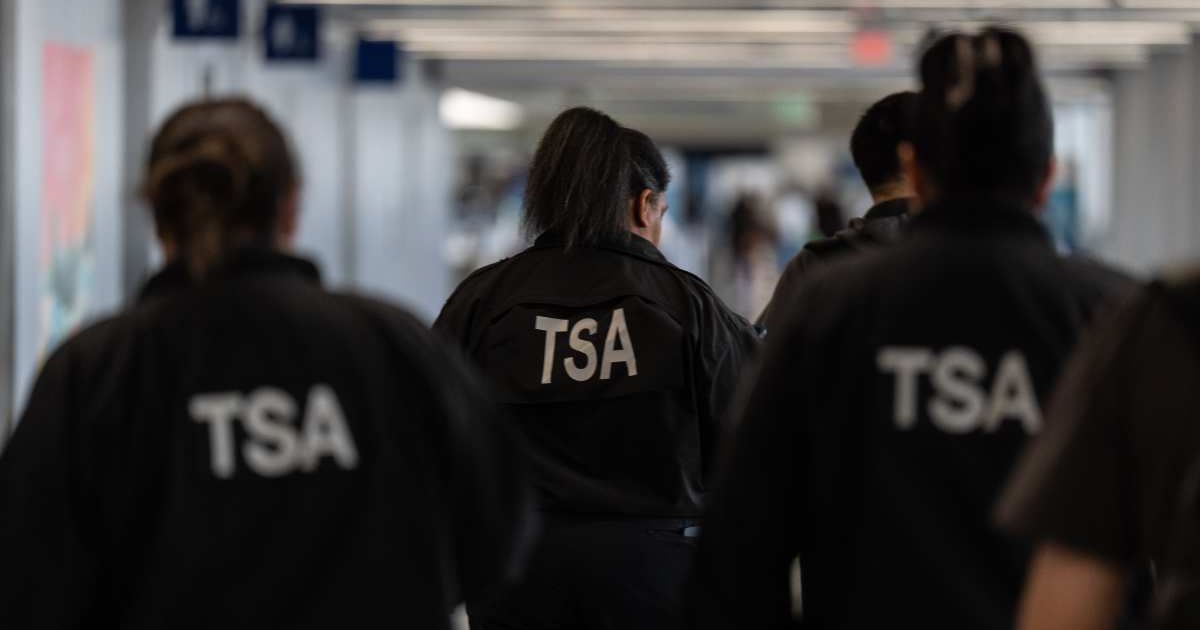 TSA agents moved through security at Los Angeles International Airport on March 27, 2026 (AP Photo/Jae C Hong)