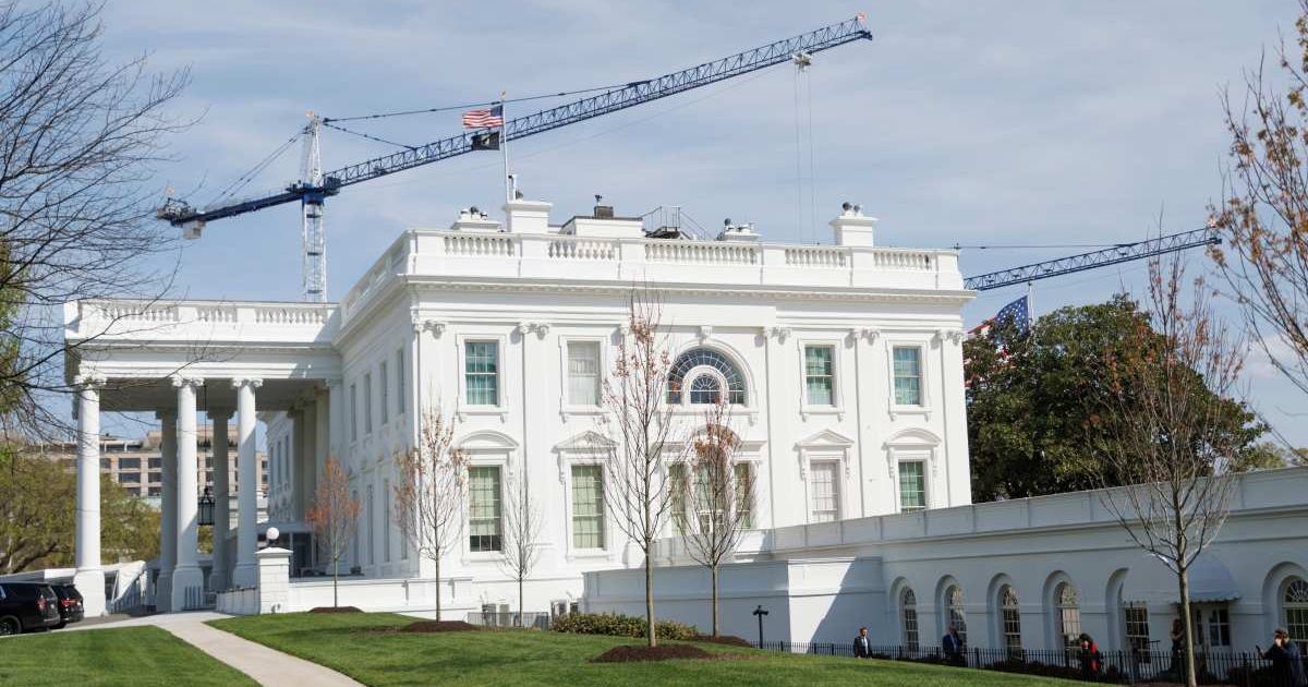 Tower cranes being used for construction of the White House Ballroom are seen at the White House, on Tuesday, March 31, 2026, in Washington (AP Photo/Tom Brenner)