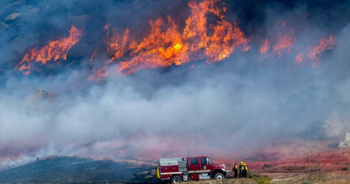 The fast-growing Springs Fire in Moreno Valley has reached 75% containment (AP Photos)