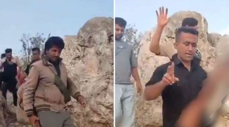 Armed Iranian tribesmen search for missing US crew member in remote hills