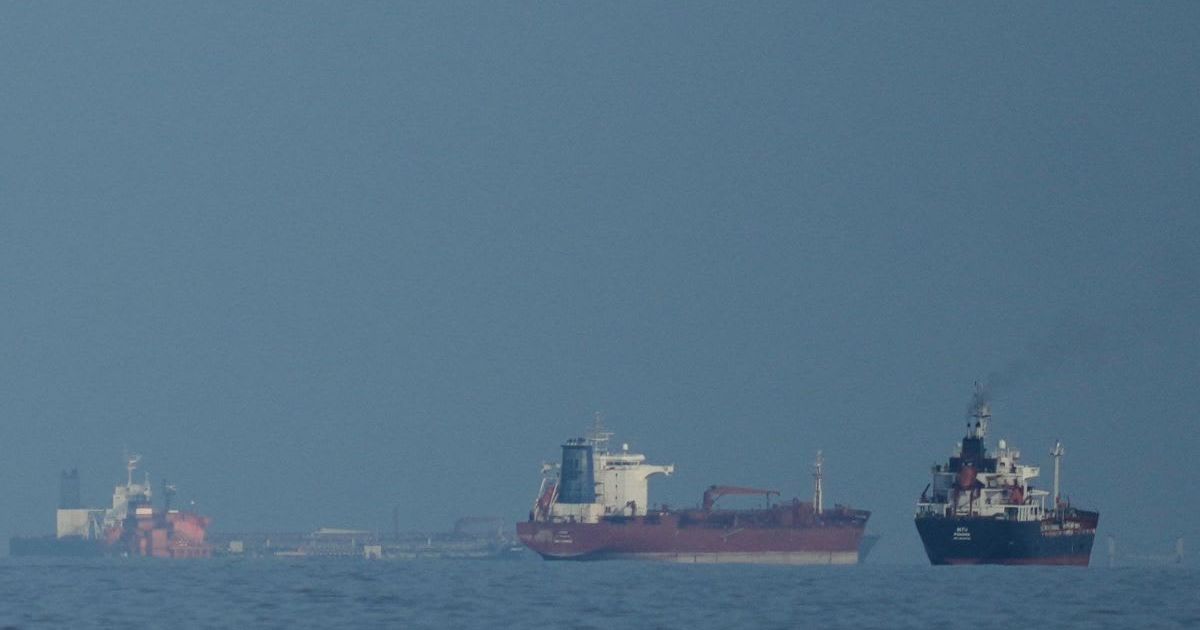 Oil tankers and cargo ships line up in the Strait of Hormuz as seen from Mina Al Fajer, United Arab Emirates, Wednesday, March 11, 2026 (AP Photo/Altaf Qadri)