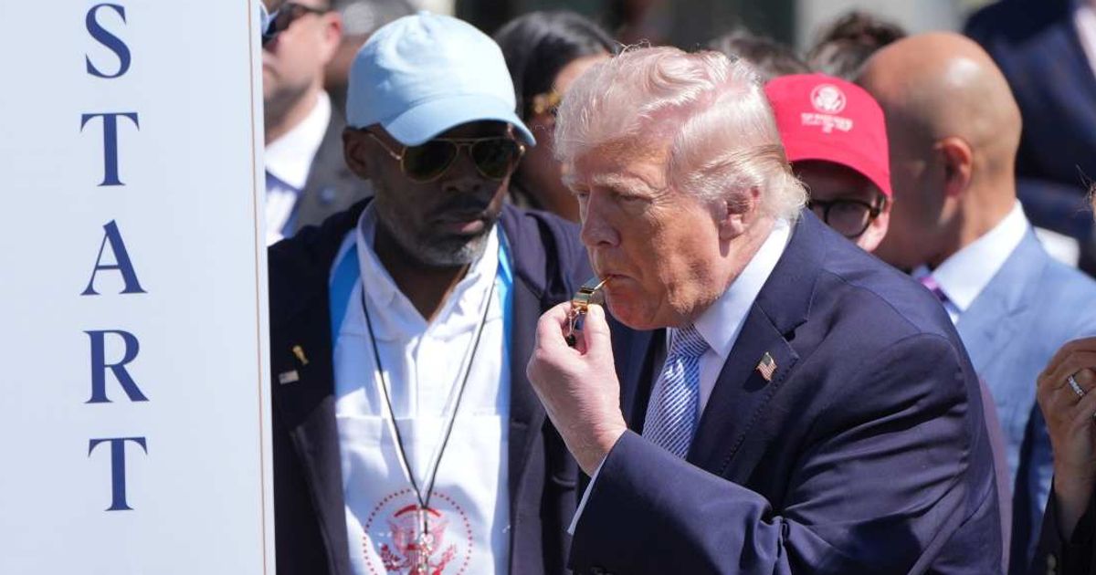 President Donald Trump blows the whistle to kick off the White House Easter Egg Roll on the South Lawn of the White House, Monday, April 6, 2026, in Washington (AP Photo/Alex Brandon) 