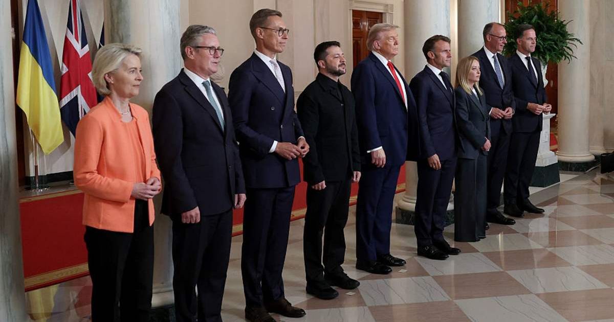 President Donald Trump and Ukrainian President Volodymyr Zelensky pose for a picture with European leaders following a meeting in the Oval Office at the White House on August 18, 2025 in Washington, DC (Getty Images) 