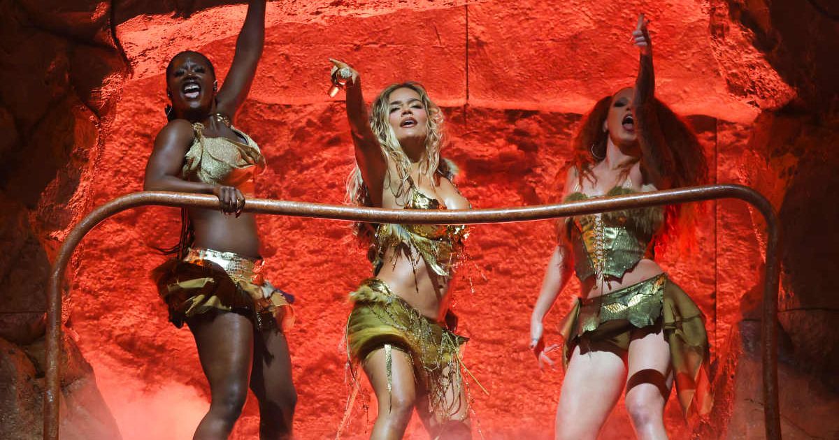 Karol G's headlining Coachella set began approximately 30 minutes after her scheduled time (Kevin Mazur/Getty Images for Coachella)