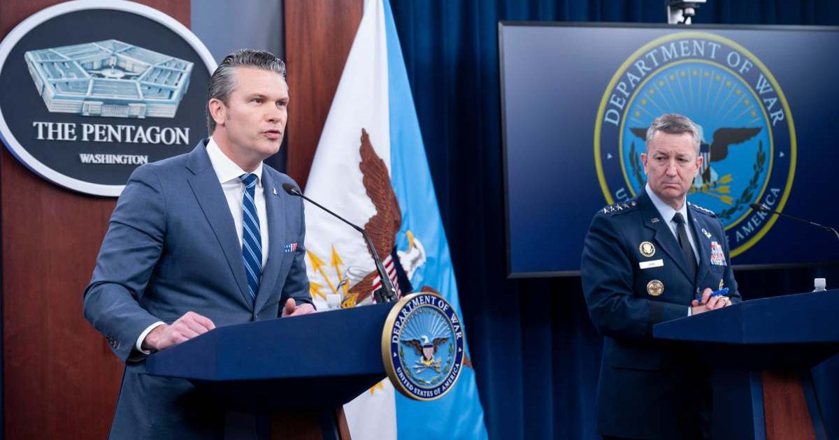 Defense Secretary Pete Hegseth and Chairman of the Joint Chiefs of Staff Gen Dan Caine speaks to members of the media during a press briefing at the Pentagon, Thursday, April 16, 2026 in Washington (AP Photo/Kevin Wolf)