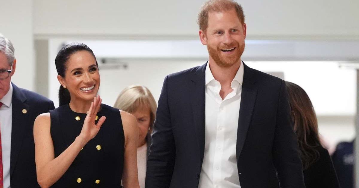 A Netflix event involving Prince Harry and Meghan Markle sparked questions after photos disappeared, with Meghan seen at ease with Netflix CEO Ted Sarandos and his wife, Nicole Avant (Jonathan Brady/Pool Photo via AP)