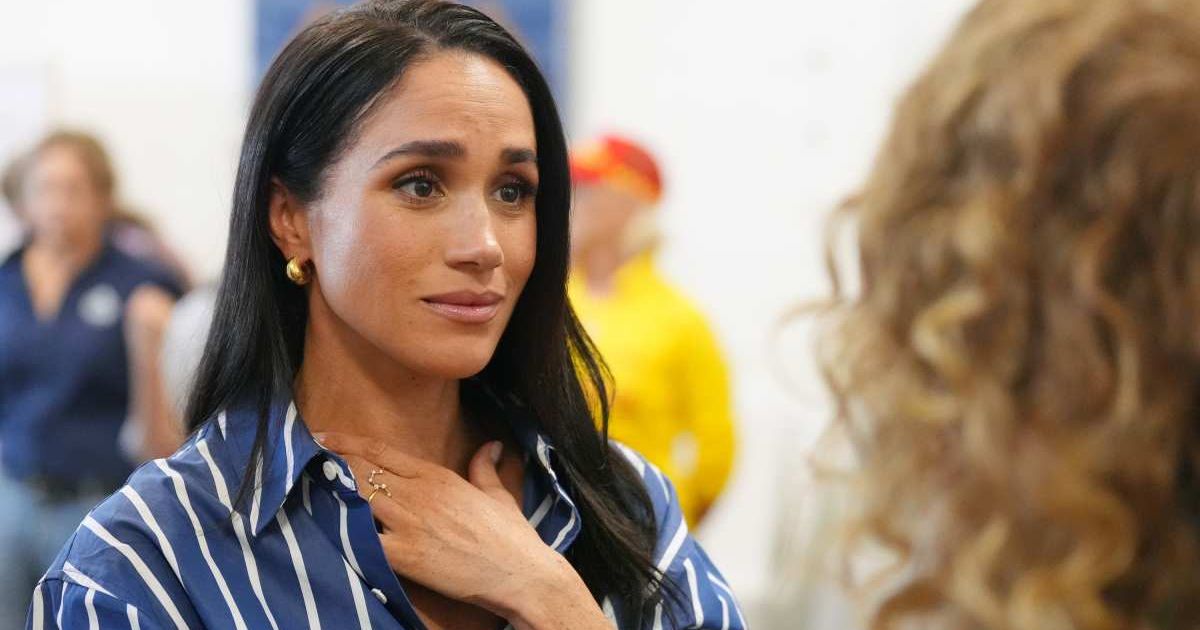 Meghan Markle, the Duchess of Sussex, meets volunteer first responders from the Bondi Surf Bathers' Life Saving Club during a visit to Bondi Beach, Australia, Friday, April 17, 2026 (Jonathan Brady/Pool Photo via AP)