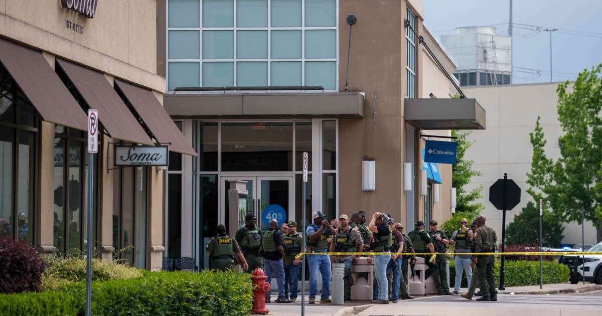 A heated argument between two groups erupted into gunfire at a Baton Rouge mall, with Baton Rouge Police Department saying both targets and bystanders were hit (AP Photo/Matthew Hinton)