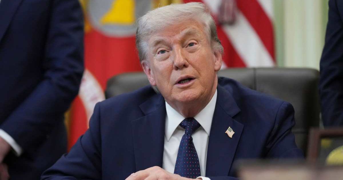 President Donald Trump listens during an event in the Oval Office at the White House on Thursday, April 23, 2026, in Washington (AP Photo/Mark Schiefelbein)