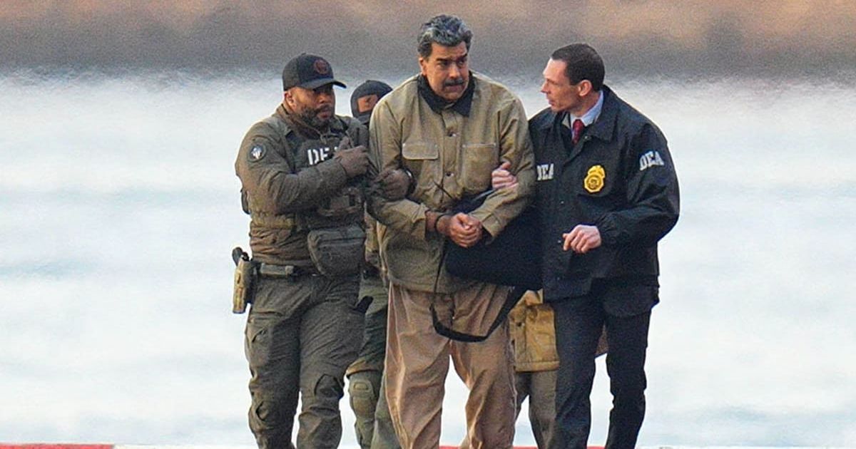 Nicolas Maduro is seen in handcuffs after landing at a Manhattan helipad, escorted by heavily armed Federal agents as they make their way into an armored car en route to a Federal courthouse in Manhattan on January 5, 2026, in New York City 