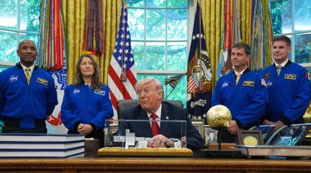 Trump’s desk picks up yet another gold trinket as Artemis crew drops by