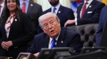 Tehran billboard shows Trump kneeling, offering Iran $100B over Hormuz