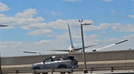 United Airlines Boeing 767 hits truck and highway light pole during Newark landing